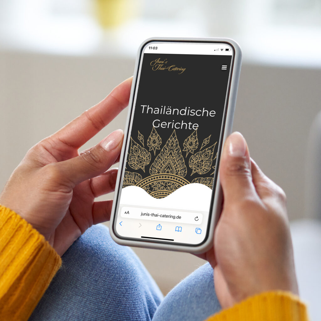 Christmas tree with cones on a dark wooden background. Copy space. Flat lay